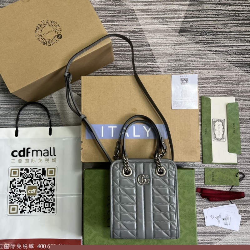 G*u*i top handle bags